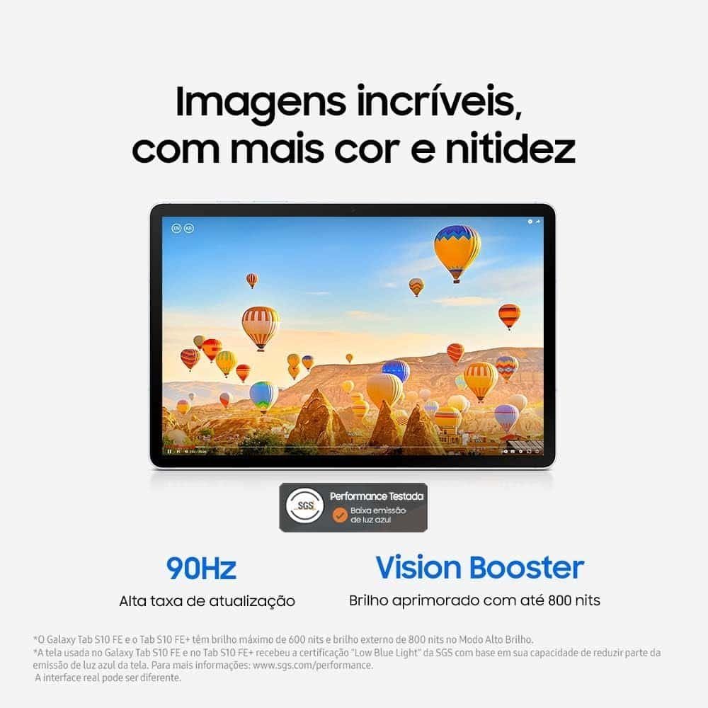 Tela com tablet mostrando balões coloridos voando ao céu, destaque para tecnologia e imagem vibrante.