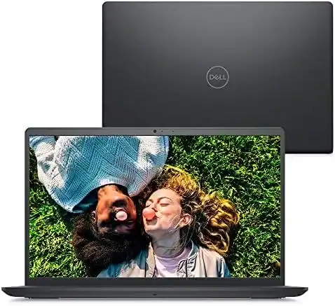 Laptops Dell modernos em uso ao ar livre com duas pessoas felizes deitados na grama.