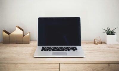 Not relevant, image of a laptop on a desk.