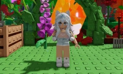 Líder em tecnologia, personagem de avatar feminino com orelhas de gato em ambiente de blocos de construção.