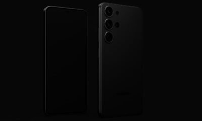 Imagem de smartphone preto com câmeras múltiplas em fundo escuro.