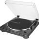 Placa de vinil com capa protetora transparente, ideal para DJs e amantes de música. Equipamento de a.