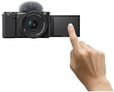 Câmera digital compact com tela articulada e controle de fotos, ideal para fotografia móvel e vlog.